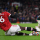 Naby Keita of Liverpool is fouled by Paul Pogba of Manchester United leading to a red card being shown following a VAR review during the Premier League match between Manchester United and Liverpool at Old Trafford.